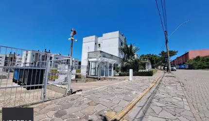 Apartamento com sacada e churrasqueira