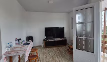 Belíssima casa de 2 dormitórios com um amplo pátio na cidade de Passo Fundo