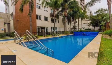 Apartamento 60m² - semi mobiliado, 2 dormitórios, 1 suíte, churrasqueira e 1 vaga de garagem no Menino Deus