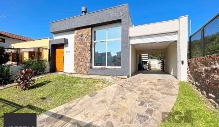 Casa em Porto Alegre, no bairro Espírito Santo, com 3 dormitório(s), e 3 banheiros, à venda.