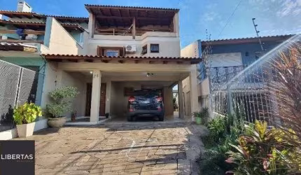 Casa em Porto Alegre, no bairro Espírito Santo, com 3 dormitório(s), e 3 banheiros, à venda.