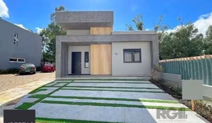 Casa em Porto Alegre, no bairro Hípica, com 3 dormitório(s), e 3 banheiros, à venda.
