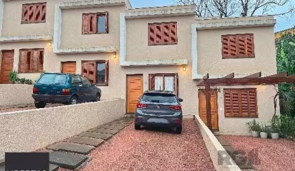 Casa Condominio em Porto Alegre, no bairro Teresópolis, com 2 dormitório(s), e 2 banheiros, à venda.