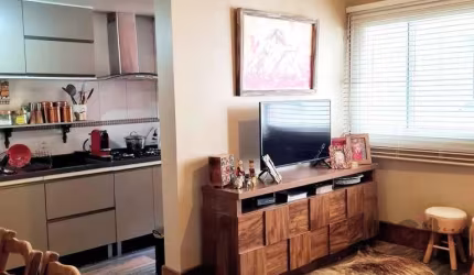 Apartamento de dois dormitórios com vaga, no Bairro Santo Antônio.