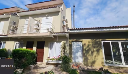 casa em condomínio com 2 dormitórios 1 suíte e sotão no bairro Hípica Porto Alegre - RS