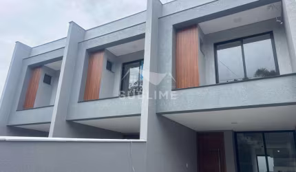Sobrado Geminado no Bairro Costa e Silva com Suíte
