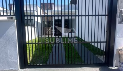 Casa Geminada em Penha com Suíte