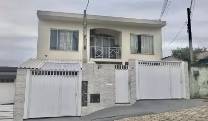 Casa com 3 quartos à venda na Albino Rocha, 7766, Bela Vista, São José por R$ 850.000