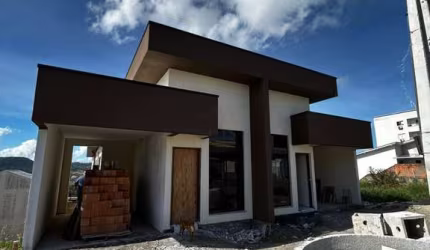 Casa com 3 quartos à venda na Travessa Osny Ubaldo Correia, 12, Forquilhas, São José por R$ 800.000