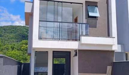 Casa com 3 quartos à venda na Rua Ivo Vicente Coelho, 112, Forquilhas, São José por R$ 590.000