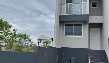 Casa com 2 quartos à venda na Rua Delgísia Maria de Souza, 3456, Sertão do Maruim, São José por R$ 440.000