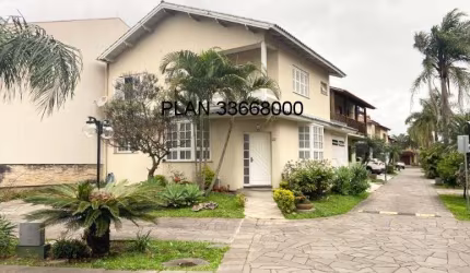 Casa em condomínio fechado com 3 quartos à venda no Ecoville, Porto Alegre  por R$ 880.000