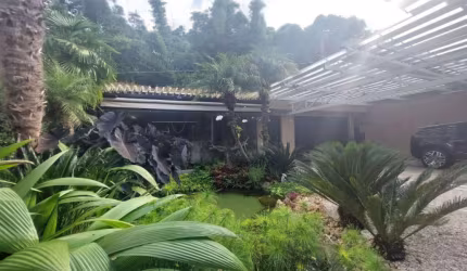 Casa com 750 m² com 4 suítes no Horto Florestal - Capa de revista