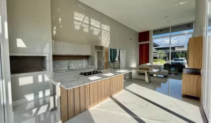 CASA COM 4 DORMITÓRIOS, 4 SUITES BEM LOCALIZADA!
