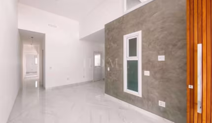 CASA GEMINADA COM 2 DORMITORIOS, SENDO 1 SUITE BEM LOCALIZADA!