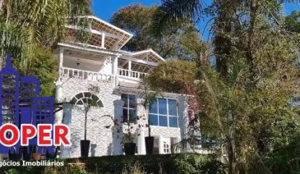 LINDA CASA DE 500 M²/4 SUITES/ESPAÇO GOURMET/PISCINA À VENDA NO CONDOMÍNIO ALPES DA CANTAREIRA, MAIRIPORÃ