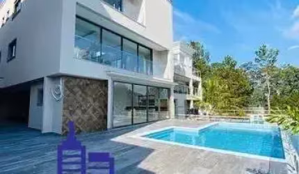 LINDACASA DE ALTO PADRÃO DE 4 SUITES/7 VAGAS/ PISCINA / ÁREA GOURMET À VENDA EM CONDMINIO FECHADO EM TAMBORÉ