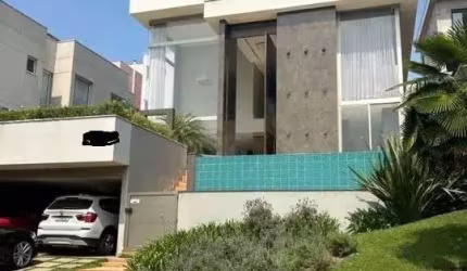 CASA DE ALTO PADRÃO COM 390 M²/4 SUITES/4 VAGAS/ ÁREA GOURMET/PISCINA PARA ALUGAR EM CONDOMINIO FECHADO EM ALPHAVILLE