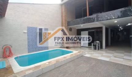 Csaa com 3 quartos, piscina e churrasqueira em Itanhaém.
