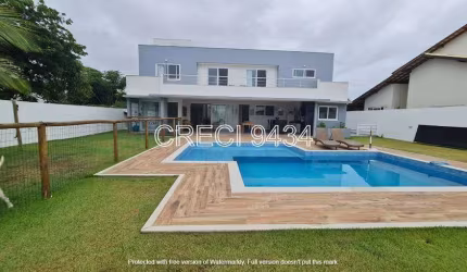 Casa de condomínio para venda possui 410 metros quadrados com 4 quartos