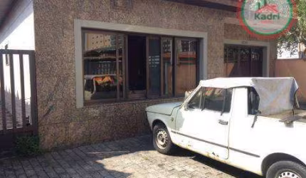 Casa com 4 dormitórios à venda, 350 m² por R$ 1.200.000,00 - Vila Guilhermina - Praia Grande/SP