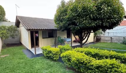 TERRENO COM CASA DE MADEIRA NO CENTRO DE CAMBE