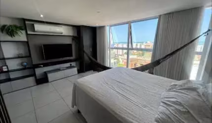 Flat mobiliado com 37 m² a poucos metros do mar