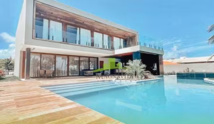 Casa frente mar em Guarajuba, 6 suítes, piscina, área gourmet, alto luxo e porteira fechada. Imóvel exclusivo em condomínio. Agende sua visita!
