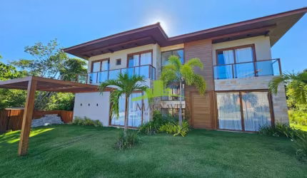 Casa à venda em Praia do Forte: 6 suítes, piscina, área gourmet, porteira fechada, 472m², Condomínio Praia Bella. Agende sua visita!