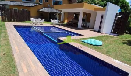 Casa de luxo em Busca Vida, 425m², 5 suítes, piscina, área gourmet e energia solar, 6 vagas. Condomínio exclusivo no litoral norte, Camaçari