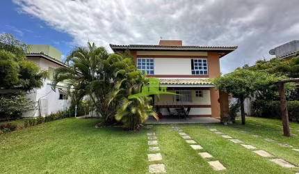 Casa à venda no Golf Quatro Rodas, Salvador: 4 suítes, home office, energia solar, área gourmet, 270m², condomínio fechado com piscina, lazer completo