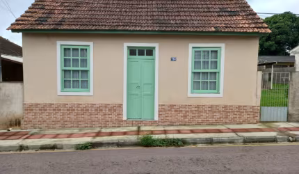 Terreno com casa na Vila do Rosario
