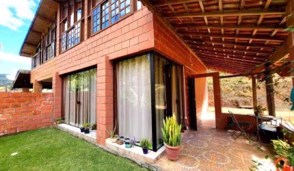 Casa de campo aconchegante em Condomínio à venda em Piracaia-SP