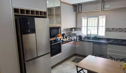 Casa com 3 dormitórios à venda, 120 m² por R$ 1.156.000,00 - Maracanã - Praia Grande/SP