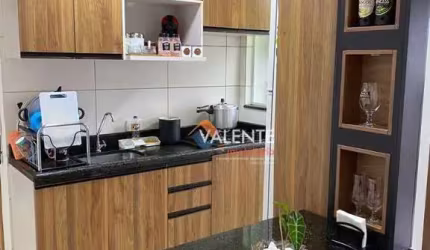 Apartamento com 2 dormitórios à venda, 55 m² por R$ 370.000,00 - Caiçara - Praia Grande/SP
