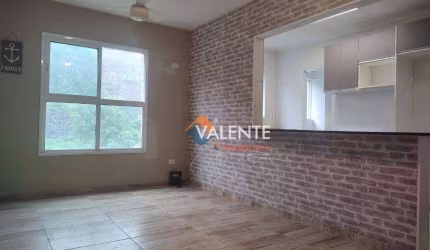 Apartamento com 2 dormitórios à venda, 58 m² por R$ 300.000,00 - Vila Voturuá - São Vicente/SP