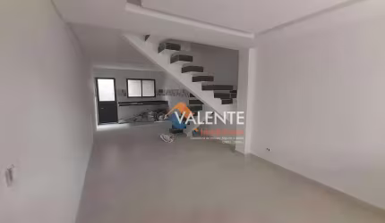 Sobrado com 3 dormitórios à venda, 108 m² por R$ 670.000,00 - Caiçara - Praia Grande/SP