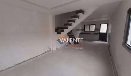 Sobrado com 3 dormitórios à venda, 108 m² por R$ 750.000,00 - Caiçara - Praia Grande/SP