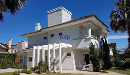 Casa em condomínio fechado com 6 quartos à venda na Central, 2000, Zona Nova, Capão da Canoa por R$ 3.549.000