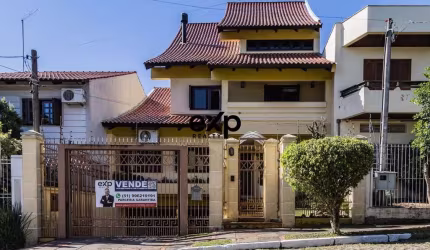 Casa com 4 quartos à venda na Avenida Pereira Pinto, 215, Jardim São Pedro, Porto Alegre por R$ 1.290.000