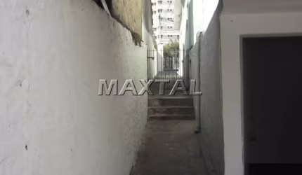 Terreno em Santa Terezinha com 228m², possui 3 casas com 127m² de área construída