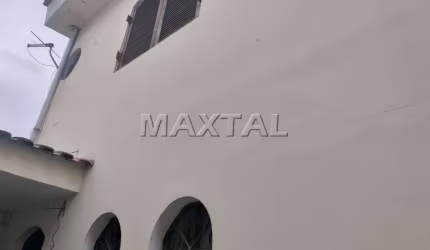 Terreno amplo à venda, com 3 casas antiga, de 250m², na Santa Teresinha.