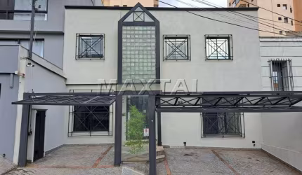 Sala comercial em Santana com 3 espaços, 2 banheiros, 1 cozinha, área de serviço e vaga.