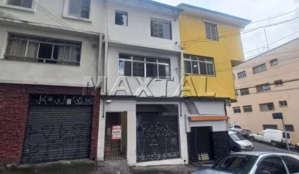 Casa Comercial com 130m², 6 salas, 4 banheiros, sem vaga na região de Santana.