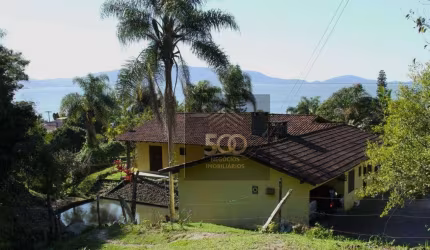 Casa com 3 dormitórios à venda, 294 m² por R$ 2.500.000,00 - Ponta de Baixo - São José/SC