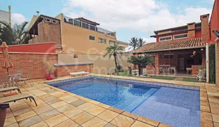 CASA à venda com piscina e 3 quartos em Peruíbe, no bairro Maria H Novaes