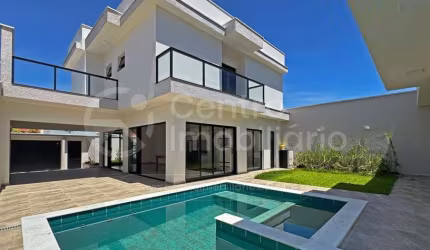 CASA à venda com piscina e 4 quartos em Peruíbe, no bairro Jardim Imperador