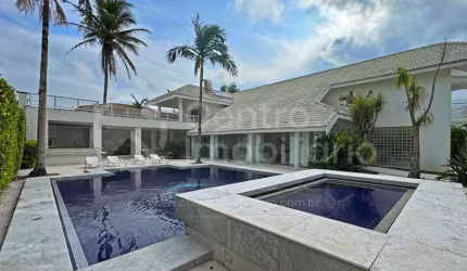 CASA à venda com piscina e 4 quartos em Peruíbe, no bairro Bougainvillee I