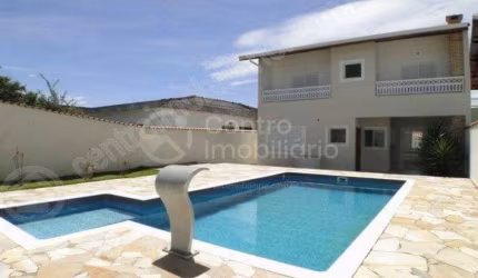 CASA à venda com piscina e 4 quartos em Peruíbe, no bairro Centro