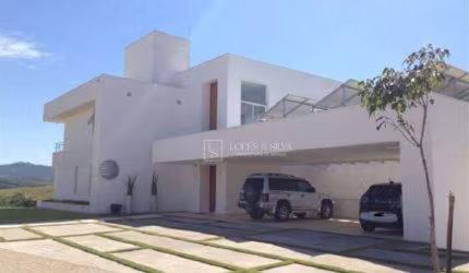 Casa com 5 dormitórios, 607 m² - venda por R$ 4.500.000,00 ou aluguel por R$ 22.844,00/mês - Condomínio Figueira Garden - Atibaia/SP
